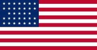 United States of America Flag with 33 stars that was inn use 4 July 1859–3 July 1861. Although admission of Kansas to the Union occurred in January, 1861, the 34th star was not added until July 4, 1861.