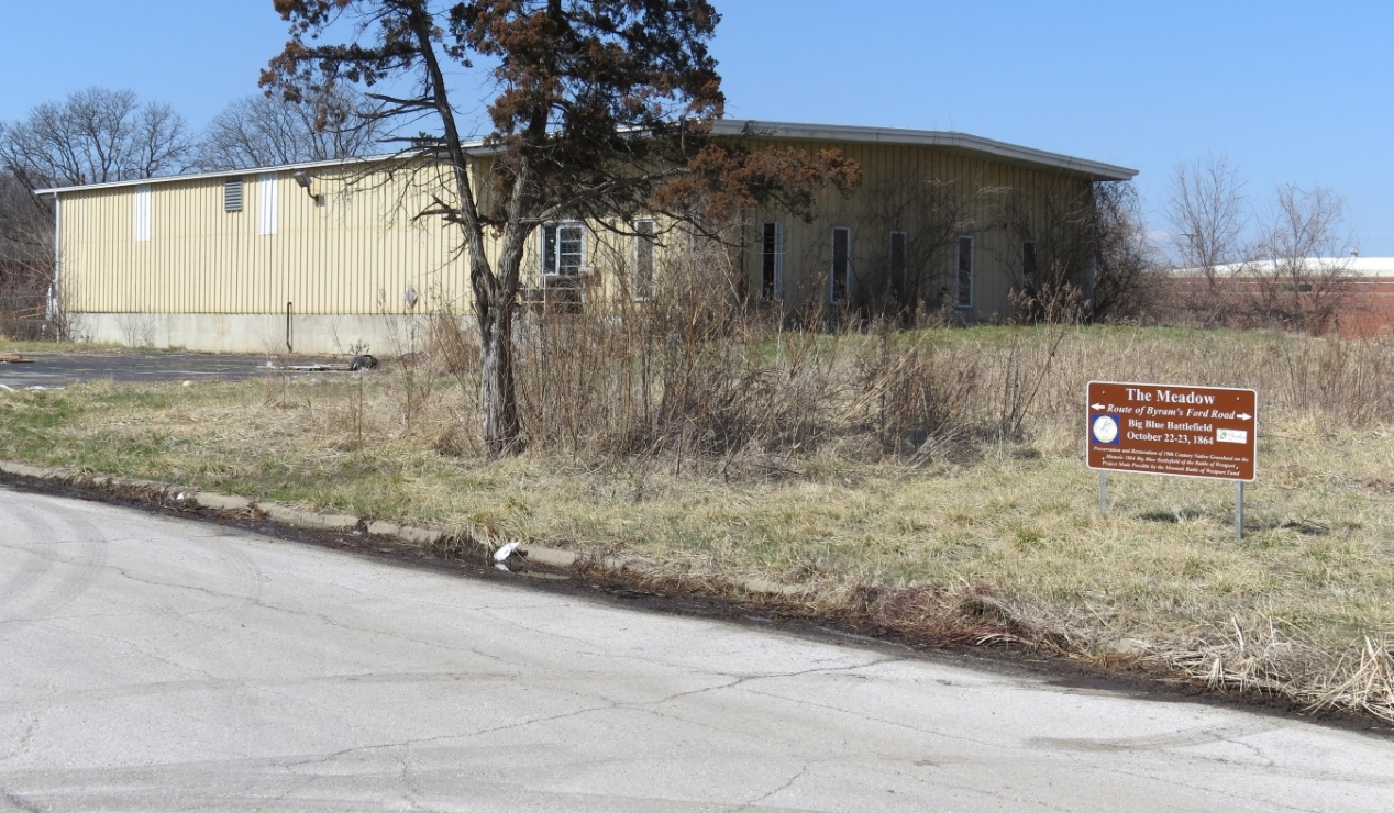 Building and parking lot at 5951 Manchester Trafficway