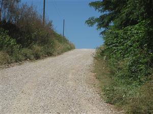 From Federal troops perspective looking west on Rocheport Road as you come out of ravine and approach the 'Marmaduke Defensive Line' tour stop