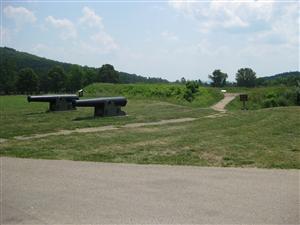 Two mounted artillery pieces near the entrance to Fort Davidson